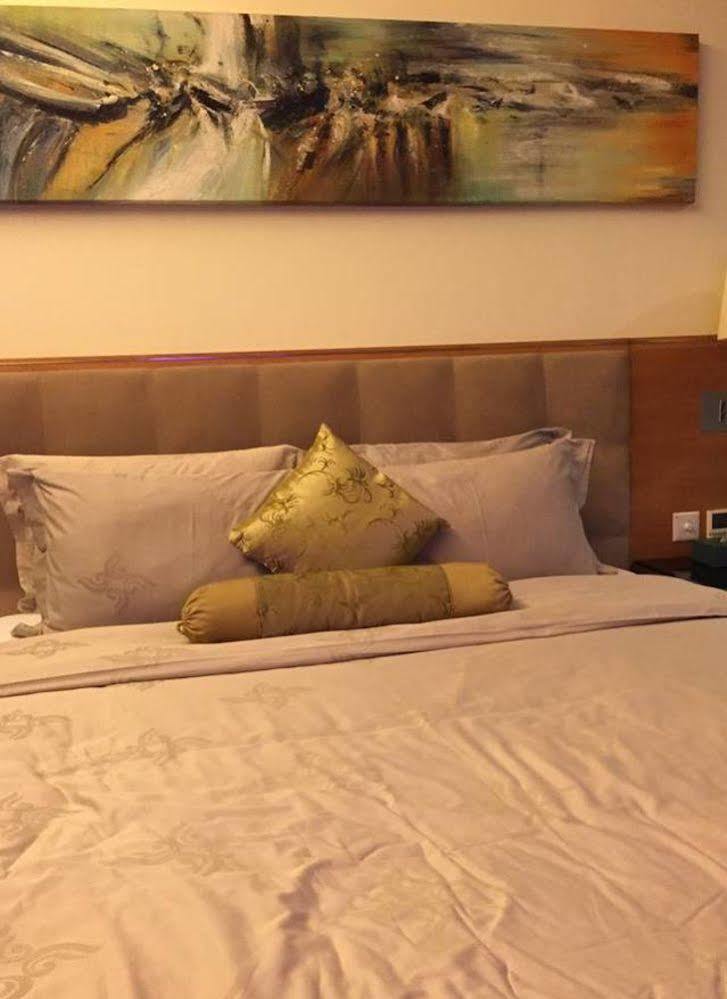 Shenzhen Longgang Rivan Hotel Exterior photo